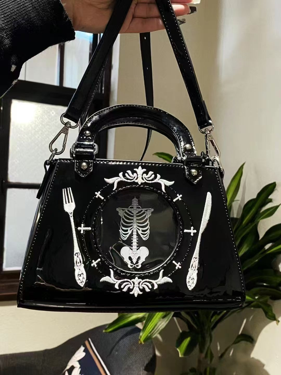 Model wearing Y2K Gothic Skeleton Bag with grunge streetwear outfit