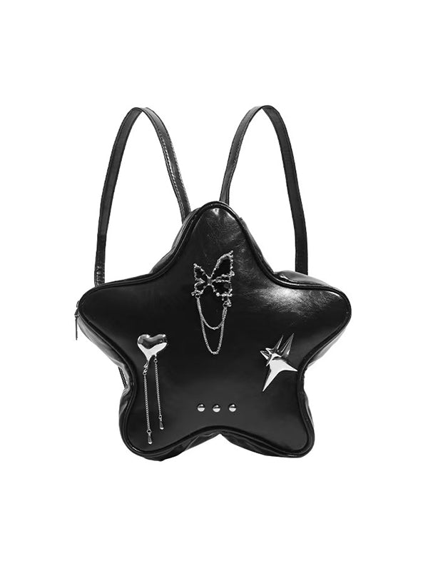 Y2K-inspired black backpack with star rivets beside Juicy Couture bag and Hunter waterproof tote