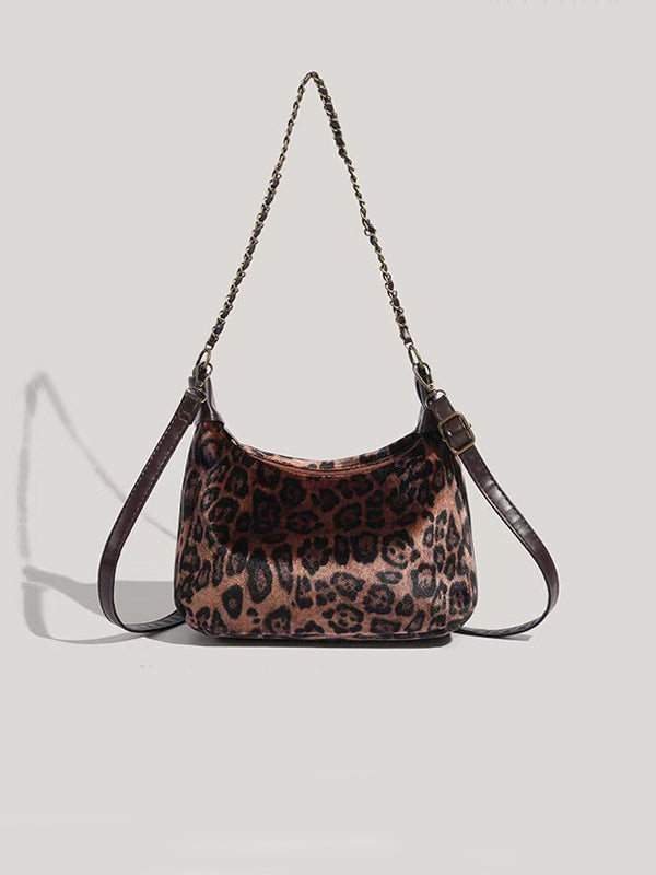 Y2K Leopard Print Shoulder Bag with oxidized chains and distressed vegan leather texture