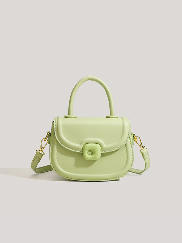 Y2K Mini Candy Messenger Bag with neon-green ombre vegan leather and glow-in-the-dark candy charms