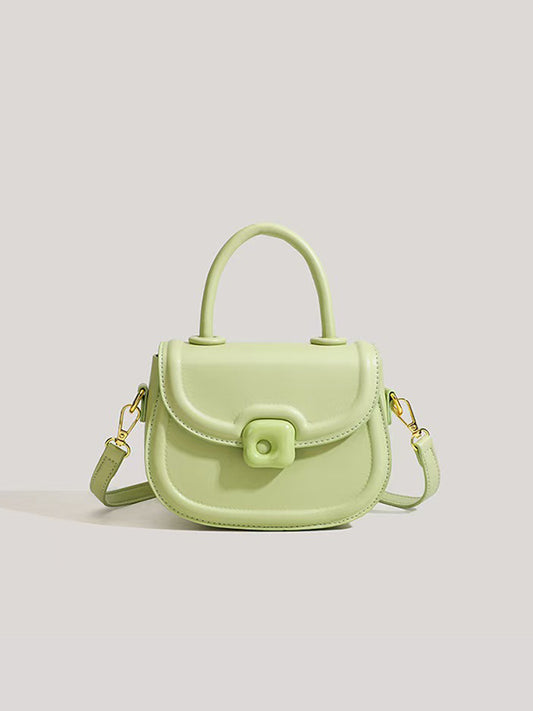 Y2K Mini Candy Messenger Bag with neon-green ombre vegan leather and glow-in-the-dark candy charms